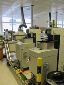 A second machine wraps the coins. Photo: UK.