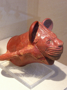 Ceramic vessel in the shape of a lioness' head. Photograph: UK.