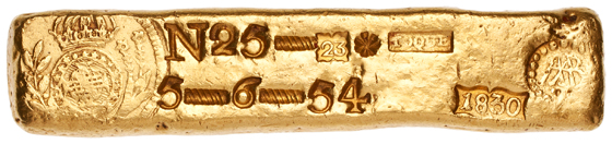 Brazil (Pedro I). Inscribed ingot, 1830. Gold, 167.22 grams. Serro Frio. Obverse: crowned arms of Portugal; 23.25 carats, 5 onças, 6 oitaves 54. These ingots were produced in Brazil from 1778 to 1833 as pseudo-monetary objects, like the US gold issues of the California Gold Rush of 1848-1855. Stamps, seals and indications of weights and purity are present, as has been the norm since the time of the Romans. Most European and American countries followed the Gold Standard at this time, sometimes alongside silver through a bimetallic standard (ANS 1963.240.1, gift of R. Henry Norweb, Sr.). Image Courtesy American Numismatic Society.