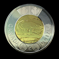 The new two-dollar coin struck with the patented multi-ply plated steel technology.