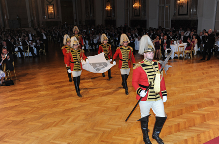 The MDC banner is carried into the ballroom.
