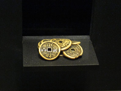 Netsuke of carved cash coins. Photo: UK.