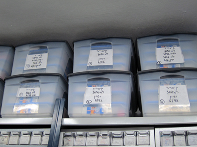 The unidentified coins are stored in large boxes. Photo: UK.