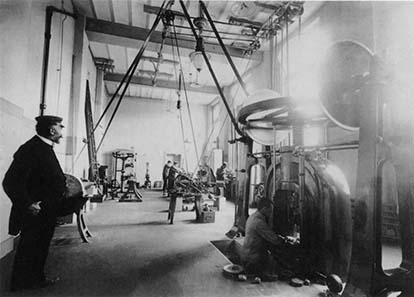 View inside the minting room: friction presses. Photograph 1908. Burgerbibliothek Bern (Photo album