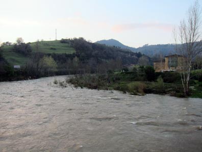 The Parador of Cangas de Onís, in Foreground, the Swollen River. Photo: KW.