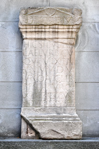 A replica of the Roman gravestone on Pfalzgasse in Zurich, found in 1747 on the Lindenhof. It features the oldest reference to the Latin city name