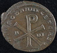 Christogram. Reverse of a bronze coin, Magnentius, Amiens (350-353 CE). KIKPE Collection.