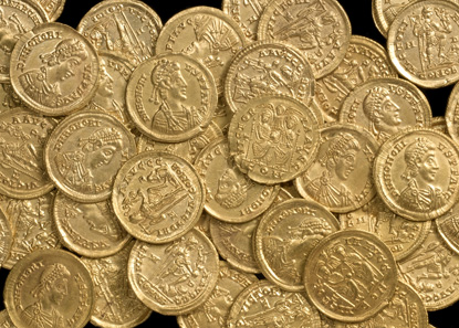 55 of the coins from the hoard, most of them were minted in the Western Empire in the late fourth century. © St Albans Museums Service.
