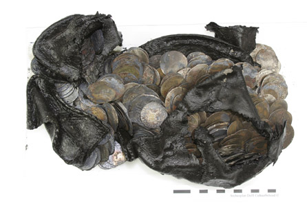 The Rotterdam coin hoard: 477 silver coins dating from the 15th and 16th centuries hidden in a shoe. © BOOR.