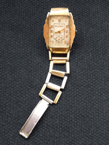 Clyde Barrow's Watch. The watch was worn by Clyde Barrow when he was gunned down with Bonnie Parker in 1934. Only part of the watch is intact because Clyde's hand was shot off in the ambush.