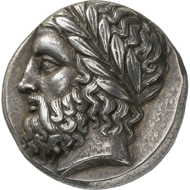 Olympia. Coin of the guardians of the Shrine of the Eleans (Peloponnesos). Stater, around 360 BC. Head of the bearded Zeus of Olympia with laurel wreath facing left. Reverse, Eagle sitting, facing right. © MoneyMuseum, Zürich.