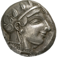 Athens. Tetradrachm, around 450 BC. Head of the goddess Athena with helmet, facing right, on the helmet are a palmette and three ornamental leaves of the olive tree. Reverse, sitting owl, facing right, a branch of the olive tree behind it with leaves and fruit, as well as a crescent moon. © MoneyMuseum, Zurich.