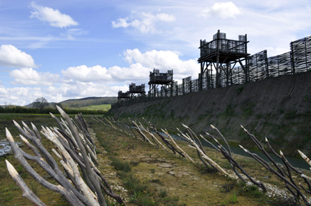 Reconstruction of the siege fortifications that Caesar ordered constructed around Alesia, site of the Gallic resistance. Photo: Prosopee. http://creativecommons.org/licenses/by-sa/3.0/deed.en