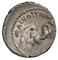 Roman Republic. Denarius, minted under the watch of mint master L. Hostilius Saserna, 48 BC. Head of a Gaul facing right, and behind it, a Gallic shield. Rev., Celtic chariot in pursuit, facing right, with Celtic warrior in full armament on the chassis. © MoneyMuseum, Zurich.