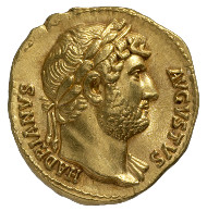 Roman Imperial Era. Hadrian (117-138). Aureus, 128. Head of Hadrian with laurel wreath facing right, delicate draping on his left shoulder. Rev. the Emperor as commander atop his rearing horse, riding to the right. © MoneyMuseum, Zurich.