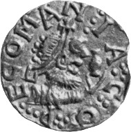 The coin is easily misread as having the obverse inscription EGOMANIAC! Arent Pol provided the correct description: 'the extraordinary tremissis, with legend PECOMANIACO (an unidentified location), when positioned correctly shows a moneyer at work on the reverse (and possibly a hand held die on the obverse as well); the design may be a pun to the name of the place (
