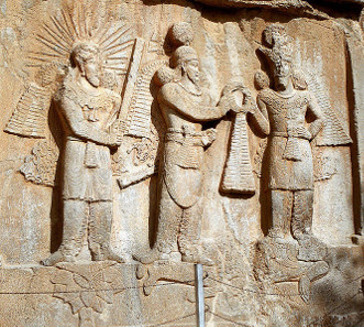 Investiture relief of Ardashir II from Taq-e-Bostan from 379. At the feet of the king (center) a bearded figure is lying, clad in Roman garments and wearing a diadem. That figure is identified with Julian who died in a battle against the Persians. Photograph: Philippe Chavin / http://creativecommons.org/licenses/by-sa/3.0/deed.en