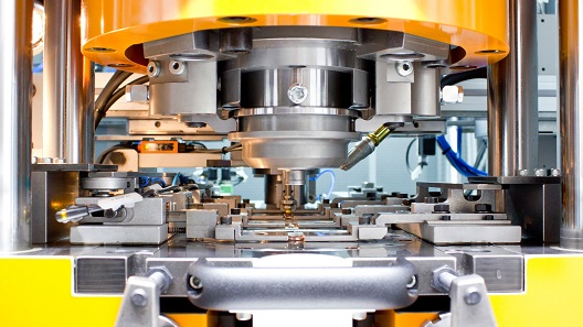 The minting process with eight hubs of up to 450 tons is achieved by an oil-hydraulic press by Sack & Kiesselbach. Photo: State Mints of Baden-Württemberg.