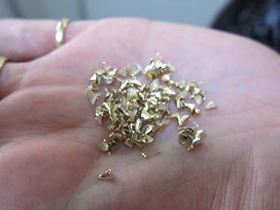 Assay chips from a gold ingot. Photo: UK.