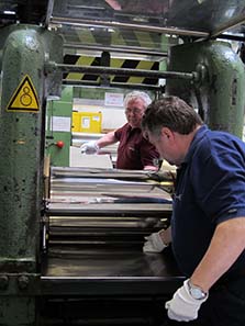 Rolling out the silver sheets. Photo: UK.