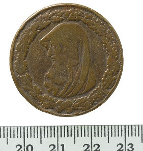 Welsh penny token, Parys Mine Company, 1787. This copper-alloy coin is a Welsh penny token, forged in the late eighteenth-century. It features a hooded bust of a Druid l, within a thick oak leaf wreath with one acorn below the tie. The coin is out of place in the collection in terms of origin, being more modern and from the west. © MOLA.
