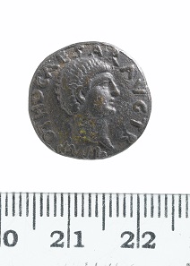 This is a 19th century western copy of a denarius of the short lived Roman emperor Otho. Signs of forgery include the coin being cast rather than struck, with edges filed to disguise this leaving an uncharacteristic flat edge. Genuine Otho coins, only minted in gold and silver, are very rare. © MOLA.