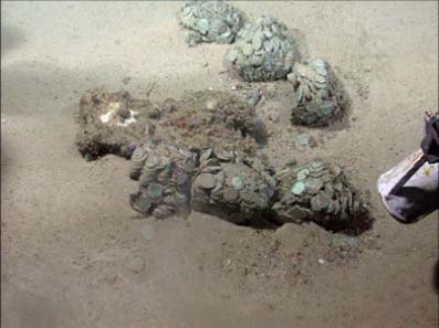 Odyssey discovered hundreds of silver coin concretions lying on the seabed at the