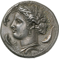 Syracuse (Sicily). Dekadrachm, 400-395 BC. A work by the engraver Euainetos, whose signature can be identified in the neck section below the dolphin.